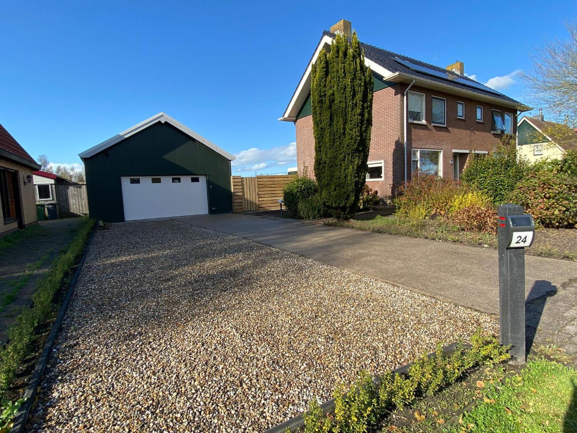 Huis Bij Het Water Met Sloepje Jutrijp Esterno foto