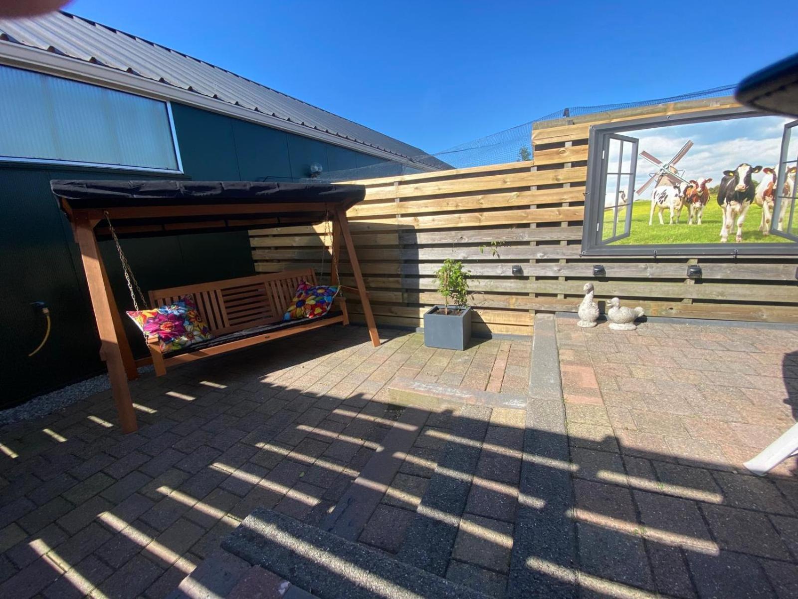 Huis Bij Het Water Met Sloepje Jutrijp Esterno foto